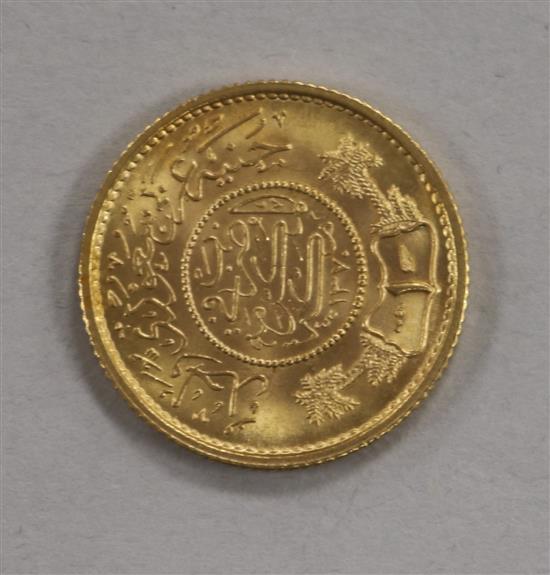 A Saudi Arabian gold one guinea coin, 1950, 7.98g, prooflike